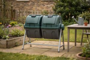 Compact dual-chamber compost tumbler designed for efficient composting in limited garden spaces.