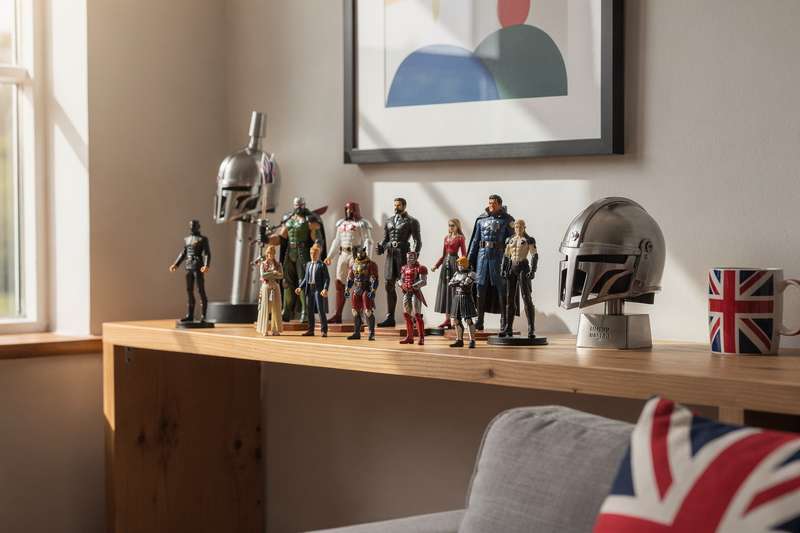 Rare action figures and vintage memorabilia displayed on collector shelves in the UK market.