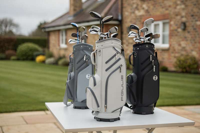 Assorted golf bags displayed side by side showing different styles and carrying options for UK courses.